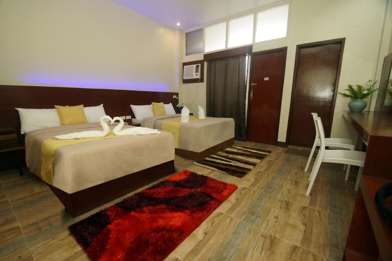 Hacasi Hotel Anibong Kültér fotó