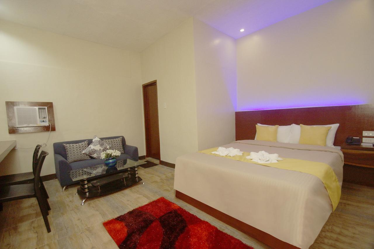 Hacasi Hotel Anibong Kültér fotó