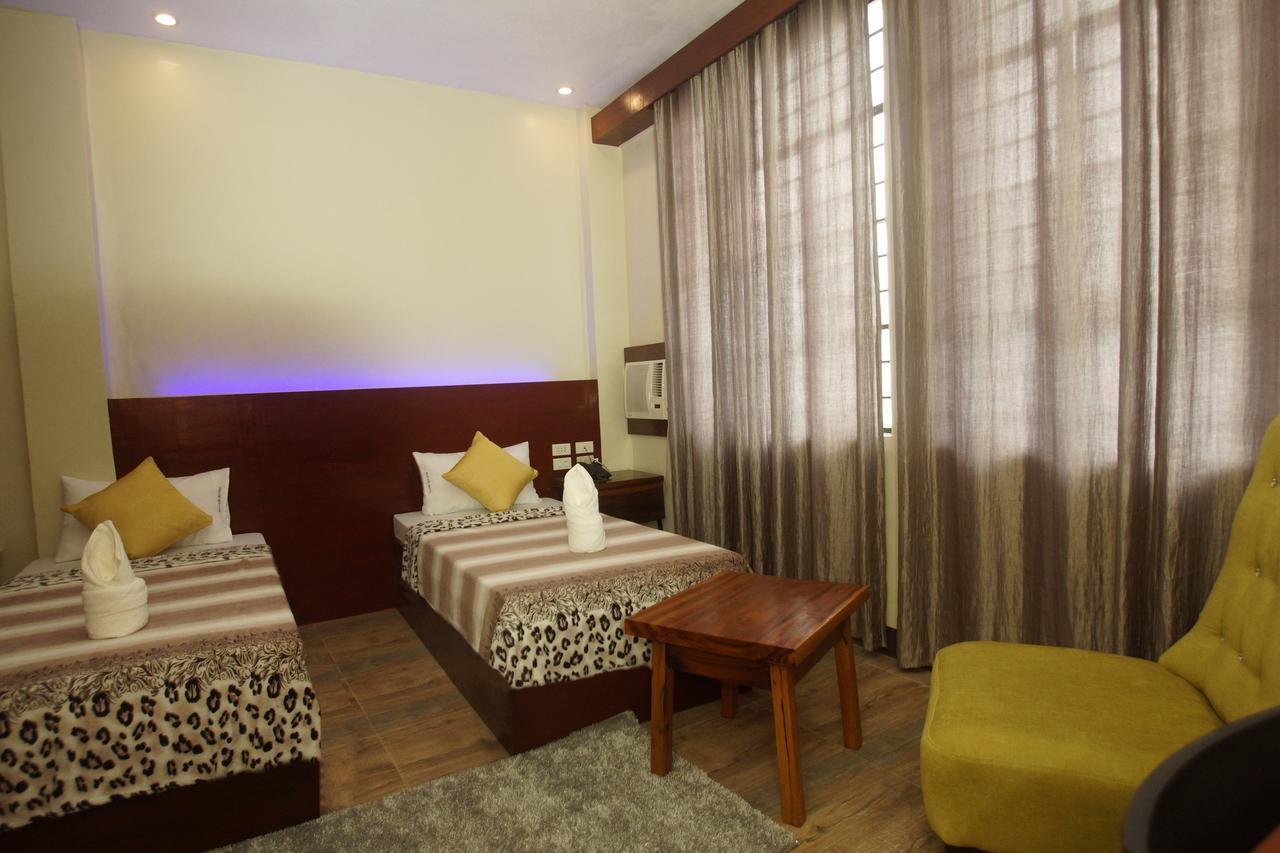 Hacasi Hotel Anibong Kültér fotó