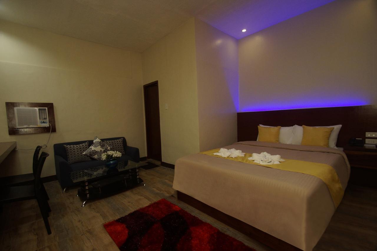 Hacasi Hotel Anibong Kültér fotó